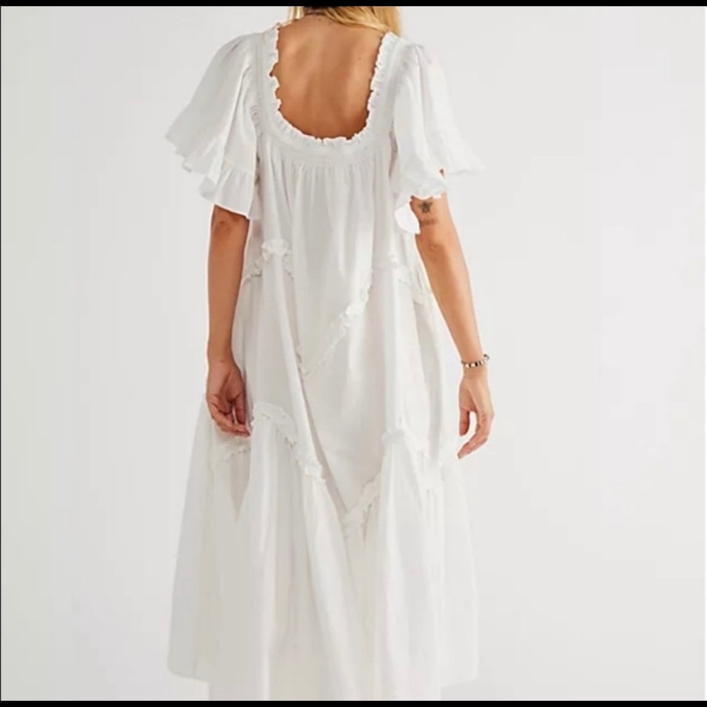 Free people white flowy dress.